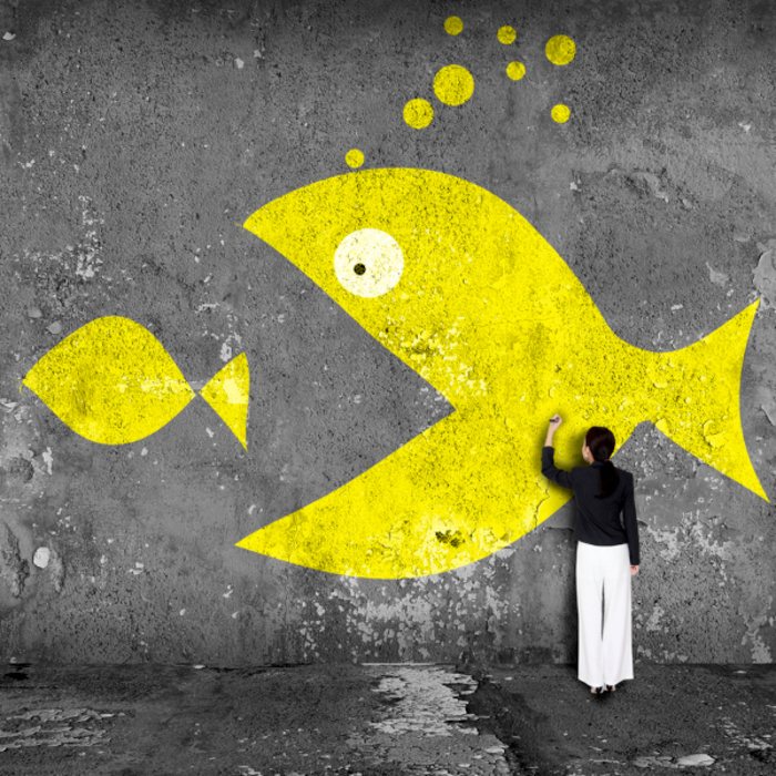 Übernahme Fusion Großer Fisch frisst kleinen iStock maxsattana.jpg